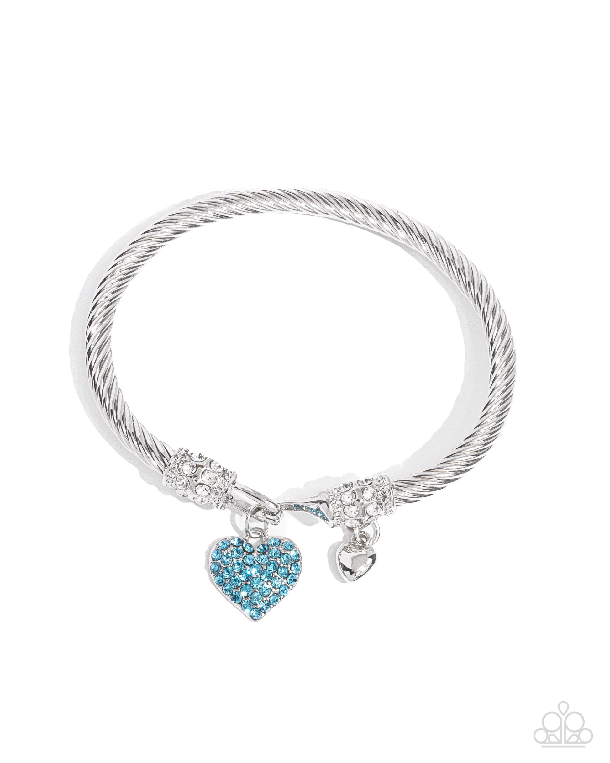 Heart Hour Blue Hook and Eye Bracelet - Paparazzi Accessories  Rippling with wavy textures, a glistening band of silver coils and twists along the wrist for a timeless display. An aquamarine rhinestone-encrusted silver heart swings from one end of the display while a dainty, solitaire silver heart swings from the other for a beautifully balanced look. Textured silver and rows of white rhinestones adorn the closures for additional refinement and glitz. Features a hook and eye closure.  Sold as one individu