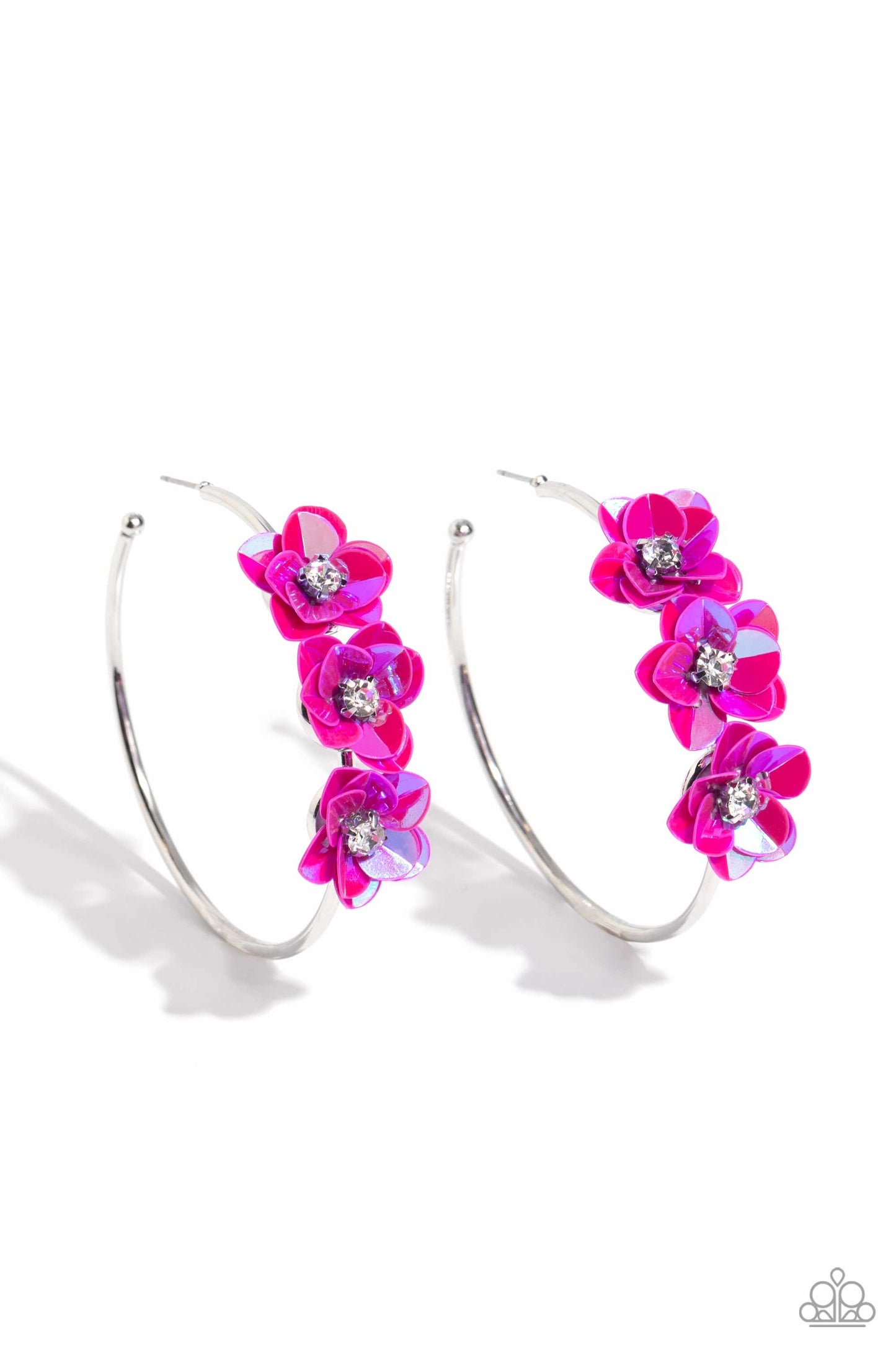Ethereal Embellishment Pink Flower Hoop Earring - Paparazzi Accessories  A trio of Fuchsia Fedora flowers, featuring an iridescent sheen and dotted with white pronged rhinestone centers, blossoms atop a thin silver hoop for a dreamy, whimsical finish. Earring attaches to a standard post fitting. Hoop measures approximately 2 1/2" in diameter. Due to its prismatic palette, color may vary.  Sold as one pair of hoop earrings.  Sku:  P5HO-PKXX-075XX