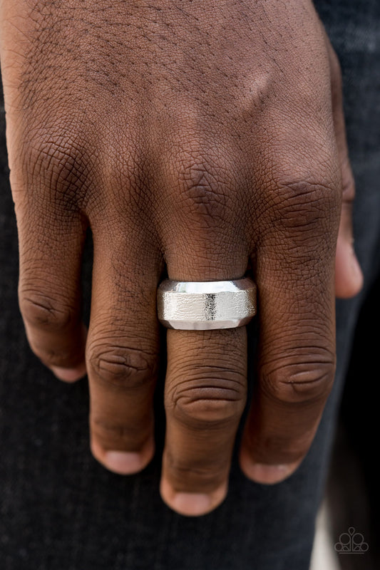 Checkmate - Silver Band Men's Collection 2019 One Life Convention Paparazzi Jewelry Ring  The center of a beveled silver band has been delicately hammered in shimmery detail for a metro inspired look. Features a stretchy band for a flexible fit.  Sold as one individual ring.