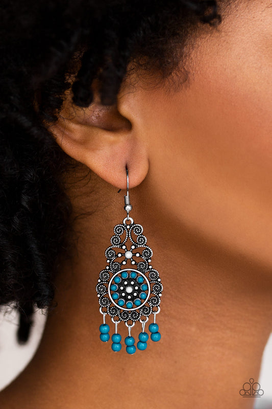 Courageously Congo Blue Earring - Paparazzi Accessories  Dainty blue and gray beads are pressed into an ornate silver frame swirling with filigree detail. Dainty beaded tassels swing from the bottom of the lure, creating a whimsical fringe. Earring attaches to standard fishhook fitting.   All Paparazzi Accessories are lead free and nickel free!  Sold as one pair of earrings.