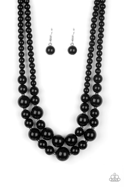 The More The Modest Black Necklace - Paparazzi Accessories   Infused with dainty silver accents, shiny black beads layer below the collar in a timeless fashion. Features an adjustable clasp closure.  Sold as one individual necklace. Includes one pair of matching earrings.