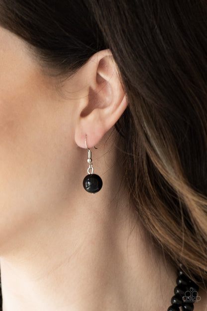 The More The Modest Black Necklace - Paparazzi Accessories   Infused with dainty silver accents, shiny black beads layer below the collar in a timeless fashion. Features an adjustable clasp closure.  Sold as one individual necklace. Includes one pair of matching earrings.