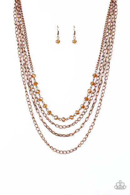 Extravagant Elegance Copper Necklace - Paparazzi Accessories  Mismatched copper chains layer down the chest. Dipped in a coppery metallic sheen, a strand of faceted black beads join below the collar for a glamorous look. Features an adjustable clasp closure.  Sold as one individual necklace. Includes one pair of matching earrings.