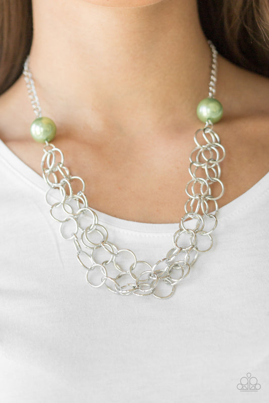 Daring Diva Green Necklace - Paparazzi Accessories  Two oversized green pearls give way to dramatic silver chains, creating bold layers below the collar for a sassy look. Features an adjustable clasp closure.   All Paparazzi Accessories are lead free and nickel free!  Sold as one individual necklace. Includes one pair of matching earrings.