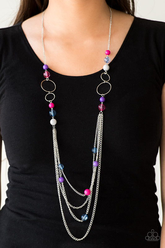 Bubbly Bright Multi Necklace - Paparazzi Accessories  Infused with shimmery silver hoops, glassy and polished multicolored beads trickle along glistening silver chains for a bubbly look. Features an adjustable clasp closure.   All Paparazzi Accessories are lead free and nickel free!  Sold as one individual necklace. Includes one pair of matching earrings.