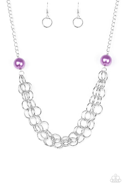 Daring Diva Purple Necklace - Paparazzi Accessories  Two oversized purple pearls give way to dramatic silver chains, creating bold layers below the collar for a sassy look. Features an adjustable clasp closure.   All Paparazzi Accessories are lead free and nickel free!  Sold as one individual necklace. Includes one pair of matching earrings.