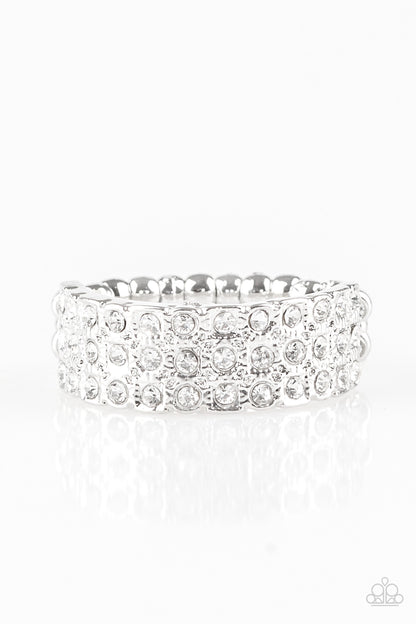 Feeling Fab-YOU-less White Ring - Paparazzi Accessories  Row after row of dazzling white rhinestones are encrusted along a dainty silver band, creating timeless shimmer. Features a dainty stretchy band for a flexible fit.  All Paparazzi Accessories are lead free and nickel free!   Sold as one individual ring.