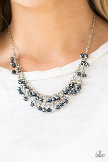 So In Season Blue Necklace - Paparazzi Accessories  Metallic blue gems and faceted silver beads dangle from two rows of silver chains, creating a glamorous fringe below the collar. Features an adjustable clasp closure.  Sold as one individual necklace. Includes one pair of matching earrings.