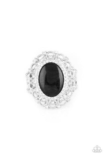 BAROQUE The Spell - Black Item #P4RE-BKXX-180XX Encrusted in dainty white rhinestones, a frilly silver frame spins around a glowing black moonstone center for a regal look. Features a stretchy band for a flexible fit.  Sold as one individual ring.