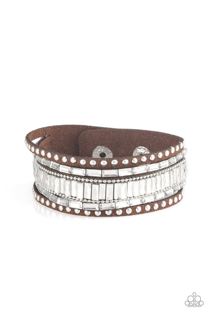 Rock Star Rocker - Brown Item #P9DI-URBN-068XX Shiny silver studs, dainty silver ball chains, and edgy white emerald-cut rhinestones race along a spliced brown suede band for a rock star look. Features an adjustable snap closure.  Sold as one individual bracelet.