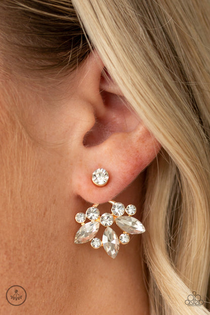 Crystal Constellations - Gold Item #E452 A solitaire white rhinestone attaches to a double-sided post, designed to fasten behind the ear. Radiating with a fringe of round and marquise style rhinestones, the double sided-post peeks out beneath the ear for a glamorous finish. Earring attaches to a standard post fitting. All Paparazzi Accessories are lead free and nickel free!  Sold as one pair of double-sided post earrings.
