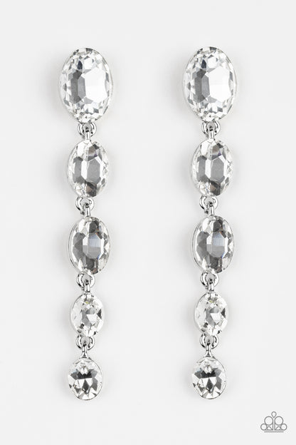 Red Carpet Radiance White Rhinestone Post Earring - Paparazzi Accessories  Gradually decreasing in size, glittery white gems trickle from the ear in a glamorous fashion. Earring attaches to a standard post fitting.  Sold as one pair of post earrings.