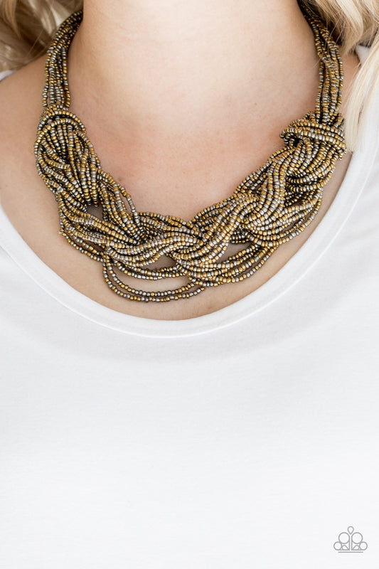 City Catwalk - Brass Item #P2ST-BRXX-023XX Brushed in a flashy finish, countless strands of brass and gunmetal seed beads weave into a bulky square braid below the collar for a glamorous look. Features an adjustable clasp closure.  Sold as one individual necklace. Includes one pair of matching earrings.