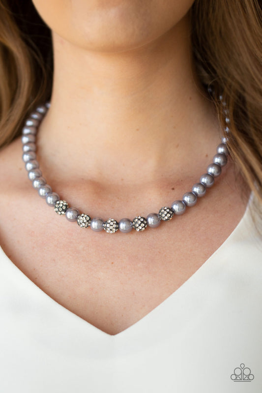 Posh Boss Silver Necklace - Paparazzi Accessories. Infused with glittery rhinestone encrusted beads, a classic strand of silver pearls drapes below the collar in a timeless fashion. Features an adjustable clasp closure.  All Paparazzi Accessories are lead free and nickel free!  Sold as one individual necklace. Includes one pair of matching earrings.  Get The Complete Look! Bracelet: "POSHing Your Luck - Silver" (Sold Separately)