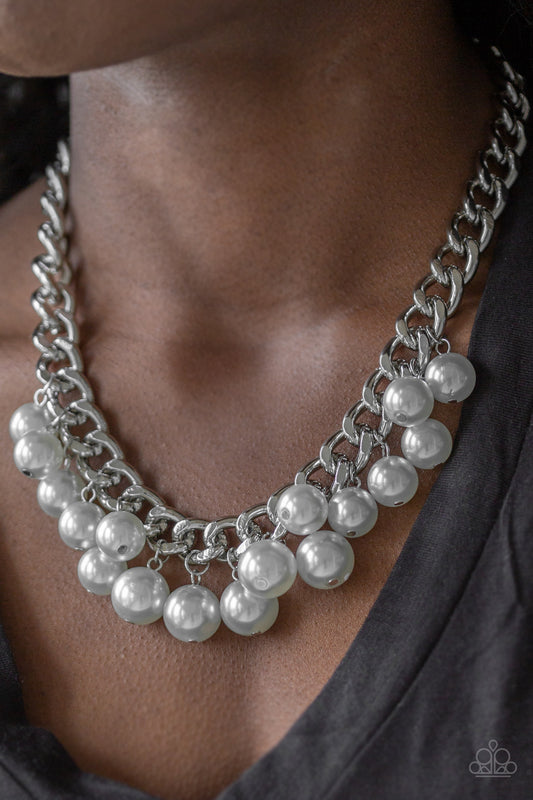 Get Off My Runway - Silver Item #P2ST-SVXX-067XX Bubbly silver pearls swing from the bottom of a hefty silver chain, creating a dramatic fringe below the collar. Features an adjustable clasp closure.  Sold as one individual necklace. Includes one pair of matching earrings.