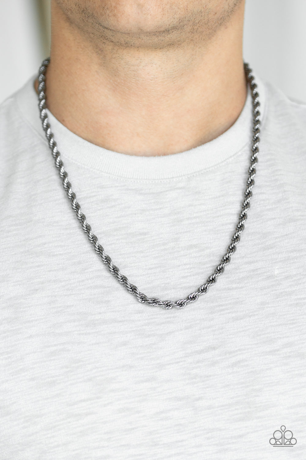 Double Dribble Black Urban Necklace - Paparazzi Accessories.  Brushed in a high-sheen finish, a thick gunmetal rope chain drapes across the chest for a classic, upscale look. Features an adjustable clasp closure.  All Paparazzi Accessories are lead free and nickel free!  Sold as one individual necklace.