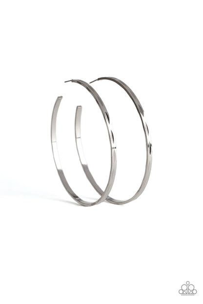 Full On Radical - Silver Item #P5HO-SVXX-196XX Featuring a high-sheen silver finish, a skinny hoop is stamped in a faceted pattern for an edgy look. Earring attaches to a standard post fitting. Hoop measures approximately 2 3/4" in diameter.  Sold as one pair of hoop earrings.