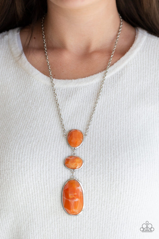 Making an Impact - Orange Item #P2SE-OGXX-211XX Featuring a colorful marble-like finish, three mismatched Orange Tiger acrylic frames link down the chest for a dramatic effect. Features an adjustable clasp closure. Color may vary.  Sold as one individual necklace. Includes one pair of matching earrings.