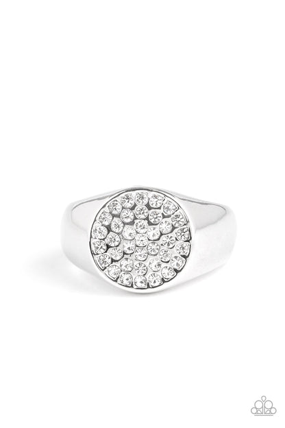 Conquest White Urban Ring - Paparazzi Accessories  Glassy white rhinestones are encrusted atop a flattened circular frame for a statement look. Features a stretchy band for a flexible fit.  All Paparazzi Accessories are lead free and nickel free!  Sold as one individual ring.