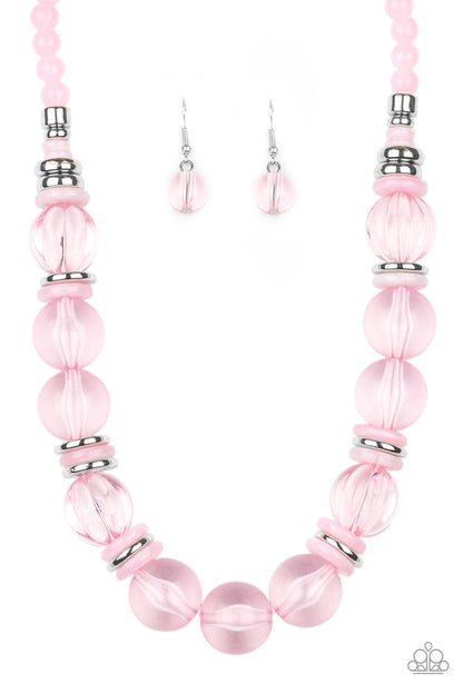 Bubbly Beauty Pink Necklace - Paparazzi Accessories  Featuring dainty silver and pink acrylic discs, a collection of oversized glassy pink beads are threaded along an invisible wire below the collar for a colorfully bubbly look. Features an adjustable clasp closure.  All Paparazzi Accessories are lead free and nickel free!  Sold as one individual necklace. Includes one pair of matching earrings.