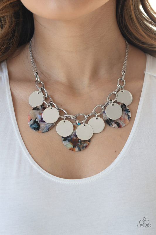 Confetti Confection Multi Necklace - Paparazzi Accessories  Attached to doubled silver chain, a playful collection of colorful acrylic discs and shiny silver discs swing from the bottom of a bold silver chain, creating a bubbly fringe below the collar. Features an adjustable clasp closure. Color may vary.  All Paparazzi Accessories are lead free and nickel free!  Sold as one individual necklace. Includes one pair of matching earrings.