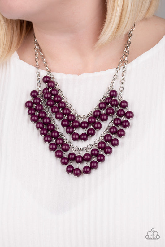 Bubbly Boardwalk Purple Necklace - Paparazzi Accessories  Pairs of plum beads cascade from the bottoms of two silver chains, creating a vivaciously layered fringe below the collar. Features an adjustable clasp closure.  All Paparazzi Accessories are lead free and nickel free!  Sold as one individual necklace. Includes one pair of matching earrings.