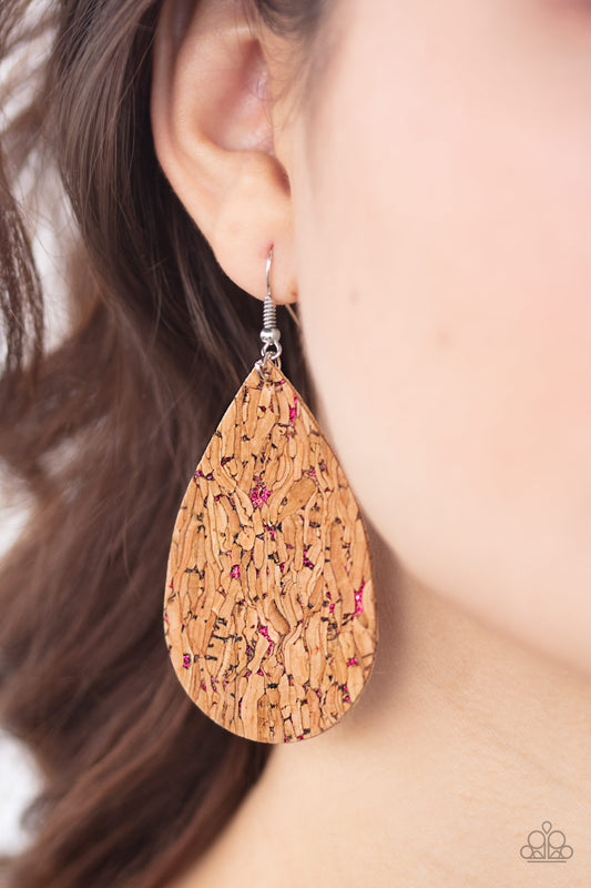 CORK It Over Pink Earring - Paparazzi Accessories  Flecked in metallic pink accents, a cork-like teardrop frame swings from the ear for a seasonal look. Earring attaches to a standard fishhook fitting.  All Paparazzi Accessories are lead free and nickel free!  Sold as one pair of earrings.
