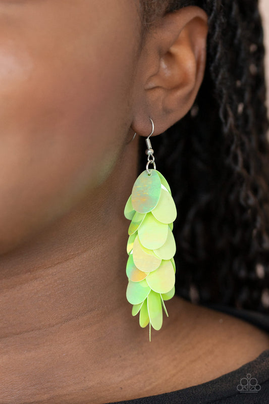 Stellar In Sequins Green Earring - Paparazzi Accessories.  Featuring an iridescent shimmer, oversized oval green sequins cascade from the ear, creating a playful fringe. Earring attaches to a standard fishhook fitting. All Paparazzi Accessories are lead free and nickel free!  Sold as one pair of earrings.