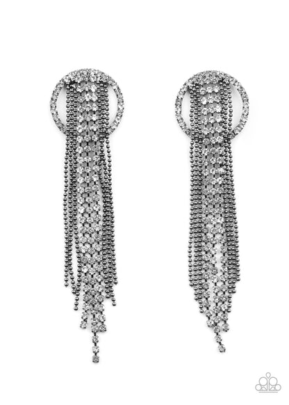 Dazzle by Default Black Earring - Paparazzi Accessories  Dainty strands of glassy white rhinestones and shimmery gunmetal ball-chain stream from the top of a bedazzled white rhinestone hoop, creating a dazzling fringe. Earring attaches to a standard post fitting.  ﻿All Paparazzi Accessories are lead free and nickel free!  Sold as one pair of post earrings.