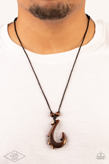 Off The Hook Urban Necklace - Paparazzi Accessories  Hanging from the bottom of a double strand of black twine is an urban hook design. Finished in an uneven brown stain, the trendy hook design is complemented with two wooden bead knotted in black twine. Sliding knot closure allows for an adjustable fit.  Sold as one individual necklace.  This Fan Favorite is back in the spotlight at the request of our 2021 Life of the Party member with Black Diamond Access, Taylor K.