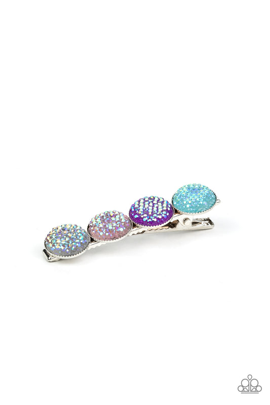 When GLEAMS Come True Multi Hair Clip - Paparazzi Accessories. Featuring an iridescent shimmer, pink, blue, and purple rhinestone dotted gems are encrusted across the front of a shiny silver bar for a colorfully bubbly look. Features a standard hair clip on the back. All Paparazzi Accessories are lead free and nickel free!  Sold as one individual hair clip.