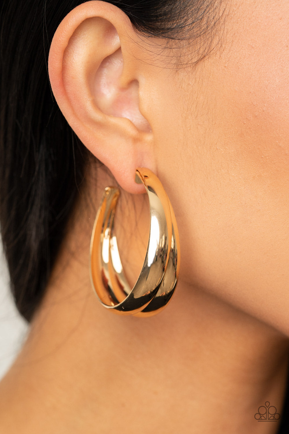 Colossal Curves Gold Hoop Earring - Paparazzi Accessories