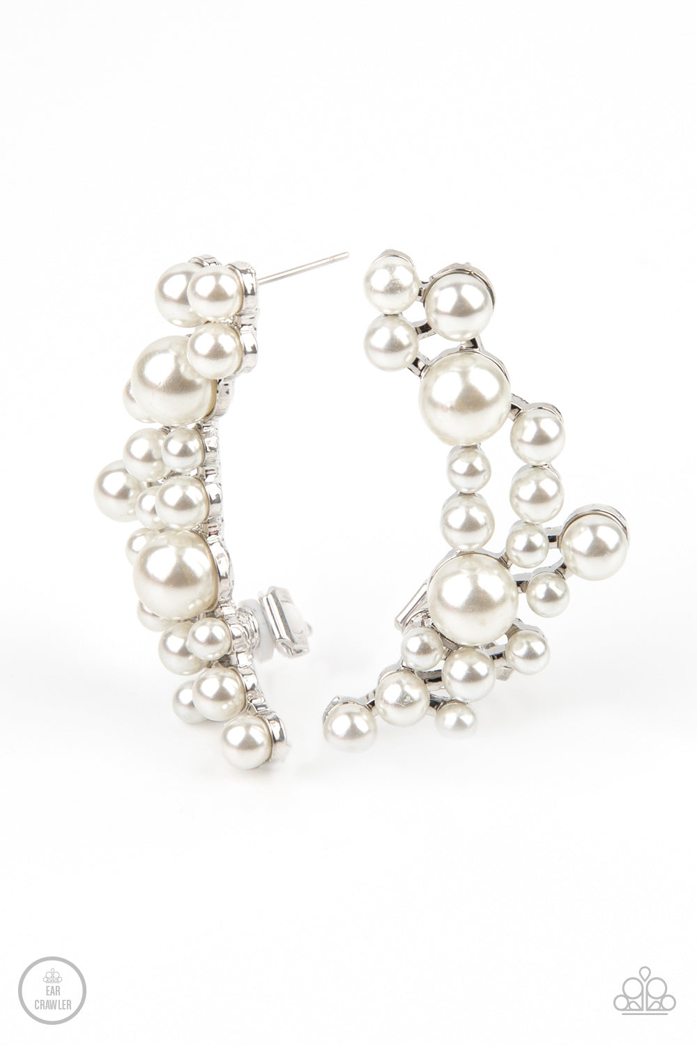 Metro Makeover White Ear Crawler Earring - Paparazzi Accessories A collection of bubbly white pearls dot a shiny silver frame that branches up the ear for a modern, timeless twist. Earring attaches to a standard post fitting. Features a clip-on fitting at the top for a secure fit. ﻿All Paparazzi Accessories are lead free and nickel free! Sold as one pair of ear crawlers.