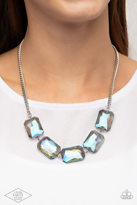 Heard It On The HEIR-Waves Blue Necklace - Paparazzi Accessories  Gorgeously oversized blue emerald-cut gems boldly link below the collar, creating an iridescently icy statement piece. Features an adjustable clasp closure.  Sold as one individual necklace. Includes one pair of matching earrings. This Fan Favorite is back in the spotlight at the request of our 2021 Life of the Party member with Black Diamond Access, Missi N.