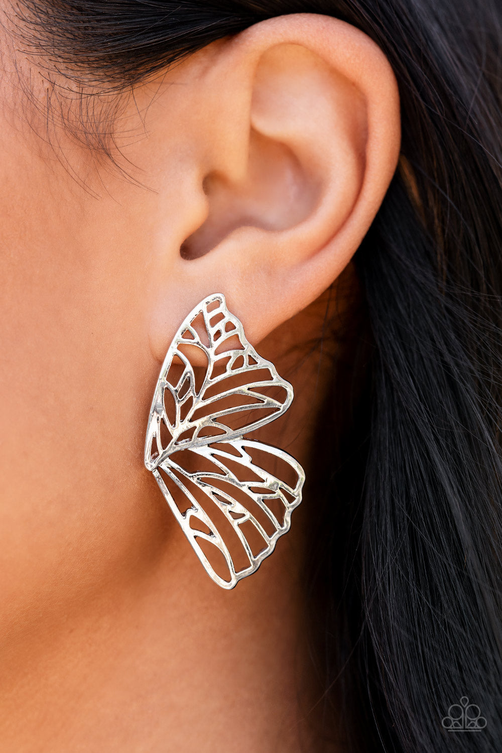 Butterfly Frills Silver Earring - Paparazzi Accessories  Shimmery silver bars delicately climb scalloped silver frames, coalescing into a whimsical butterfly wing. Earring attaches to a standard post fitting.  All Paparazzi Accessories are lead free and nickel free!  Sold as one pair of double-sided post earrings.
