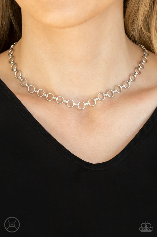 Insta Connection Silver Choker Necklace - Paparazzi Accessories. Attached to dainty fittings, a collection of shiny silver links connect around the neck for a minimalist inspired fashion. Features an adjustable clasp closure.  All Paparazzi Accessories are lead free and nickel free!  Sold as one individual choker necklace. Includes one pair of matching earrings.