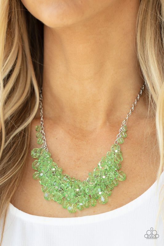Let The Festivities Begin Green Necklace - Paparazzi Accessories.  Row after row of glittery green crystal-like beads swing from interconnected strands of silver chain, creating a colorfully effervescent fringe below the collar. Features an adjustable clasp closure.  ﻿﻿﻿All Paparazzi Accessories are lead free and nickel free!  Sold as one individual necklace. Includes one pair of matching earrings.