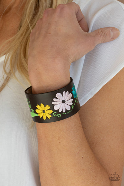 Western Eden Multi Wrap Bracelet - Paparazzi Accessories  A colorful floral pattern is embroidered across the front of a brown leather band, creating a whimsical centerpiece around the wrist. Features an adjustable snap closure.  All Paparazzi Accessories are lead free and nickel free!  Sold as one individual bracelet.