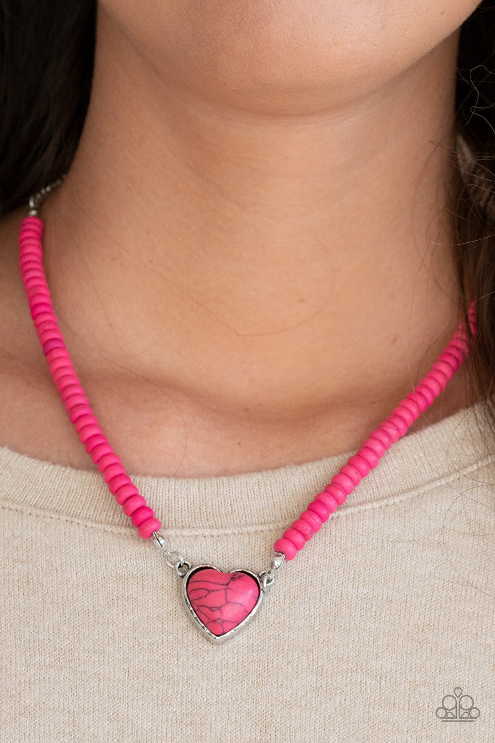 Country Sweetheart Pink Heart Necklace - Paparazzi Accessories  Infused with pink stone beads, a charming pink heart stone pendant swings below the collar for a free-spirited look. Features an adjustable clasp closure.  Sold as one individual necklace. Includes one pair of matching earrings.  Get The Complete Look! Bracelet: "Charmingly Country - Pink" (Sold Separately)