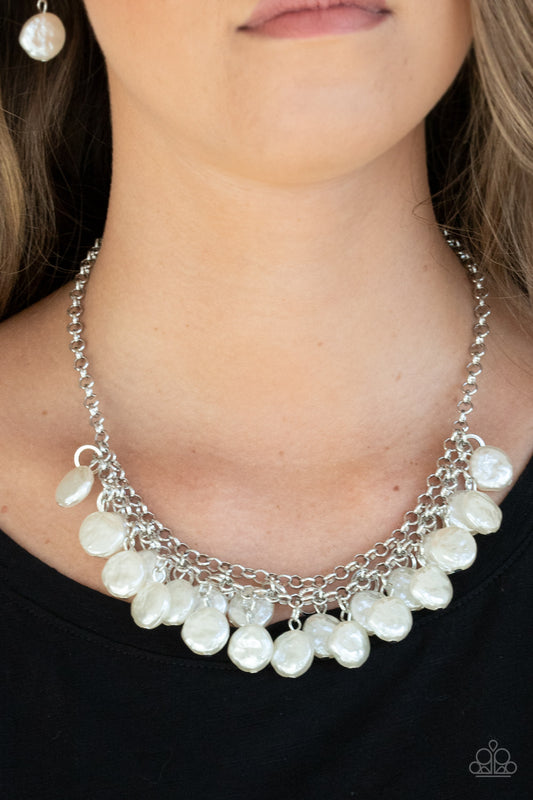 BEACHFRONT and Center White Necklace - Paparazzi Accessories   Featuring delicately hammered surfaces, rows of pearly white beads cascade from the bottoms of interlocking silver chains. Dainty silver rings swing from the top of the timelessly tiered display, creating a refined fringe below the collar. Features an adjustable clasp closure.  ﻿All Paparazzi Accessories are lead free and nickel free!  Sold as one individual necklace. Includes one pair of matching earrings.