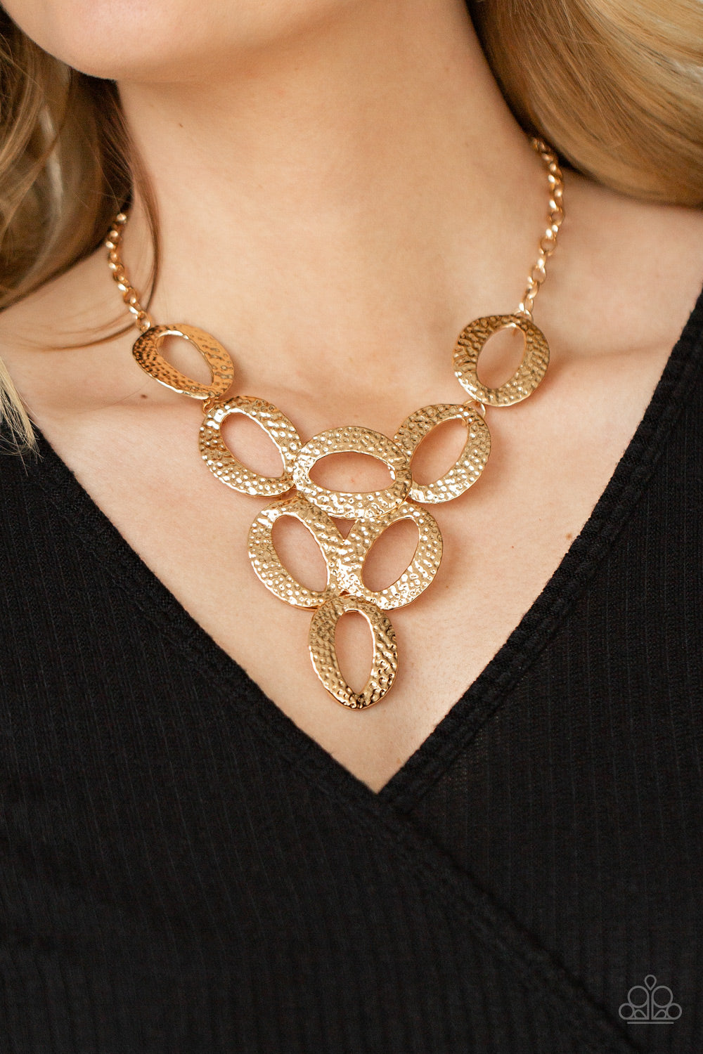 OVAL The Limit Gold Necklace - Paparazzi Accessories  Hammered in shimmery detail, oversized gold ovals delicately link into a dramatic centerpiece below the collar for a refined look. Features an adjustable clasp closure.  Sold as one individual necklace. Includes one pair of matching earrings.