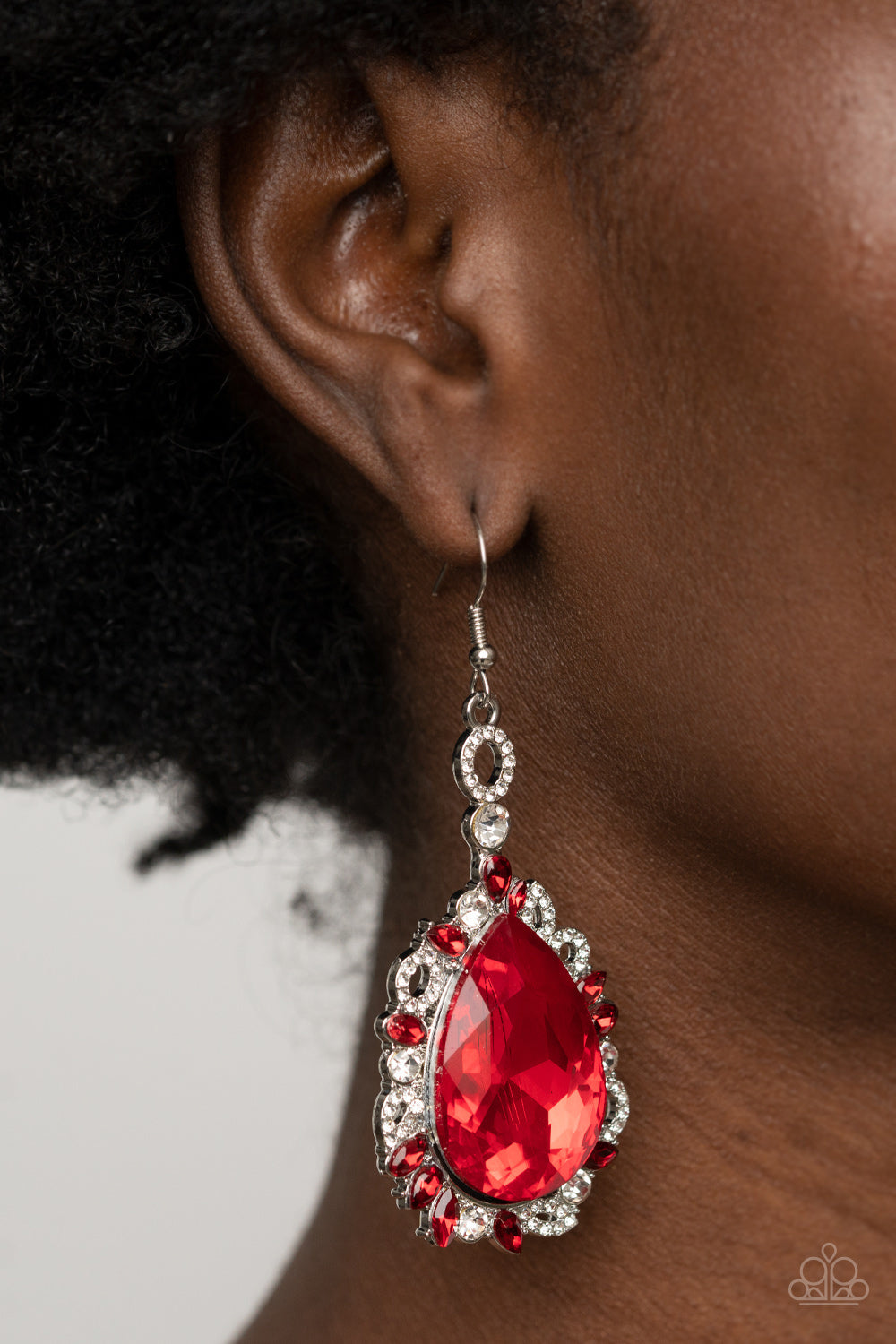 Royal Recognition Red Earring - Paparazzi Accessories.  Featuring round, teardrop, and oval shapes, red and white rhinestone encrusted filigree borders a dramatically oversized red rhinestone teardrop for a jaw-dropping dazzle. Earring attaches to a standard fishhook fitting.  ﻿﻿﻿All Paparazzi Accessories are lead free and nickel free!  Sold as one pair of earrings.