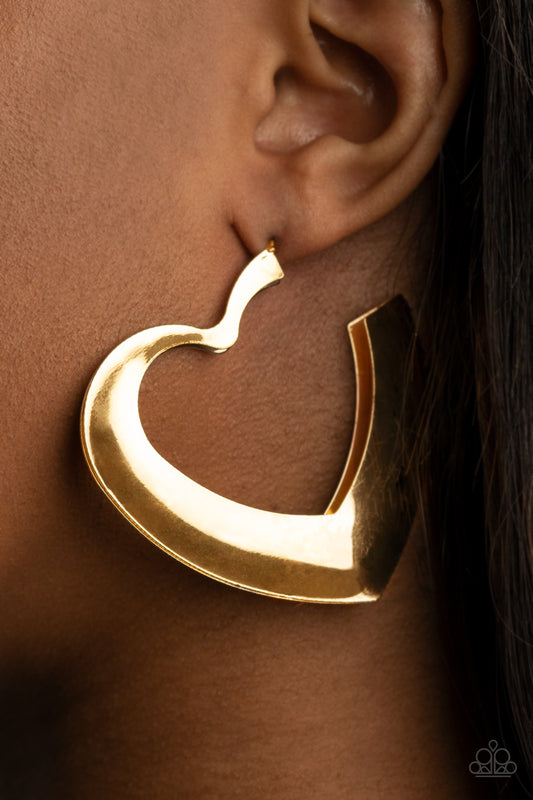 Heart-Racing Radiance Gold Hoop Earring - Paparazzi Accessories  Flat gold frames delicately collect into a voluminous heart shaped hoop for a flirtatious display. Earring attaches to a standard post fitting. Hoop measures approximately 2 1/4" in diameter.  Sold as one pair of hoop earrings.