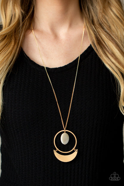 Moonlight Sailing Gold Necklace - Paparazzi Accessories. A white shell-like disc swings from the top of a flat gold hoop at the bottom of a lengthened gold chain. A flat gold crescent frame swings from the bottom of the display, creating a sleekly stacked pendant. Features an adjustable clasp closure.  All Paparazzi Accessories are lead free and nickel free!  Sold as one individual necklace. Includes one pair of matching earrings.