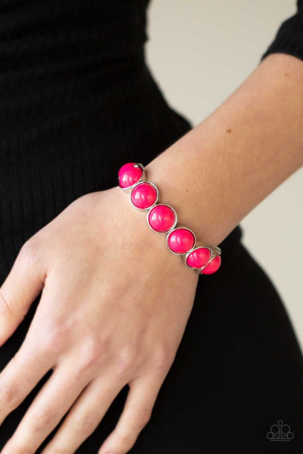 POP, Drop, and Roll Pink Bracelet - Paparazzi Accessories  Featuring flamboyant pink beaded centers, bubbly silver frames are threaded along stretchy bands around the wrist for a powerful pop of color.  All Paparazzi Accessories are lead free and nickel free!  Sold as one individual bracelet.