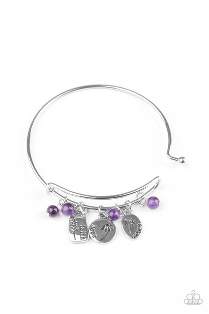 GROWING Strong Purple Bangle Bracelet - Paparazzi Accessories  Glassy purple stone beads and silver floral charms stamped in the words, "faith," "hope," and "peace," glide along a dainty bangle-like cuff around the wrist for a whimsical flair. Features an adjustable toggle closure.  Sold as one individual bracelet.