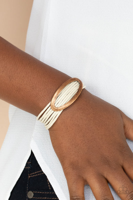 Corded Couture White Bracelet - Paparazzi Accessories.  An oval copper fitting glides along strands of rustic white cording, creating colorful layers around the wrist. Features a magnetic closure.  ﻿All Paparazzi Accessories are lead free and nickel free!  Sold as one individual bracelet.