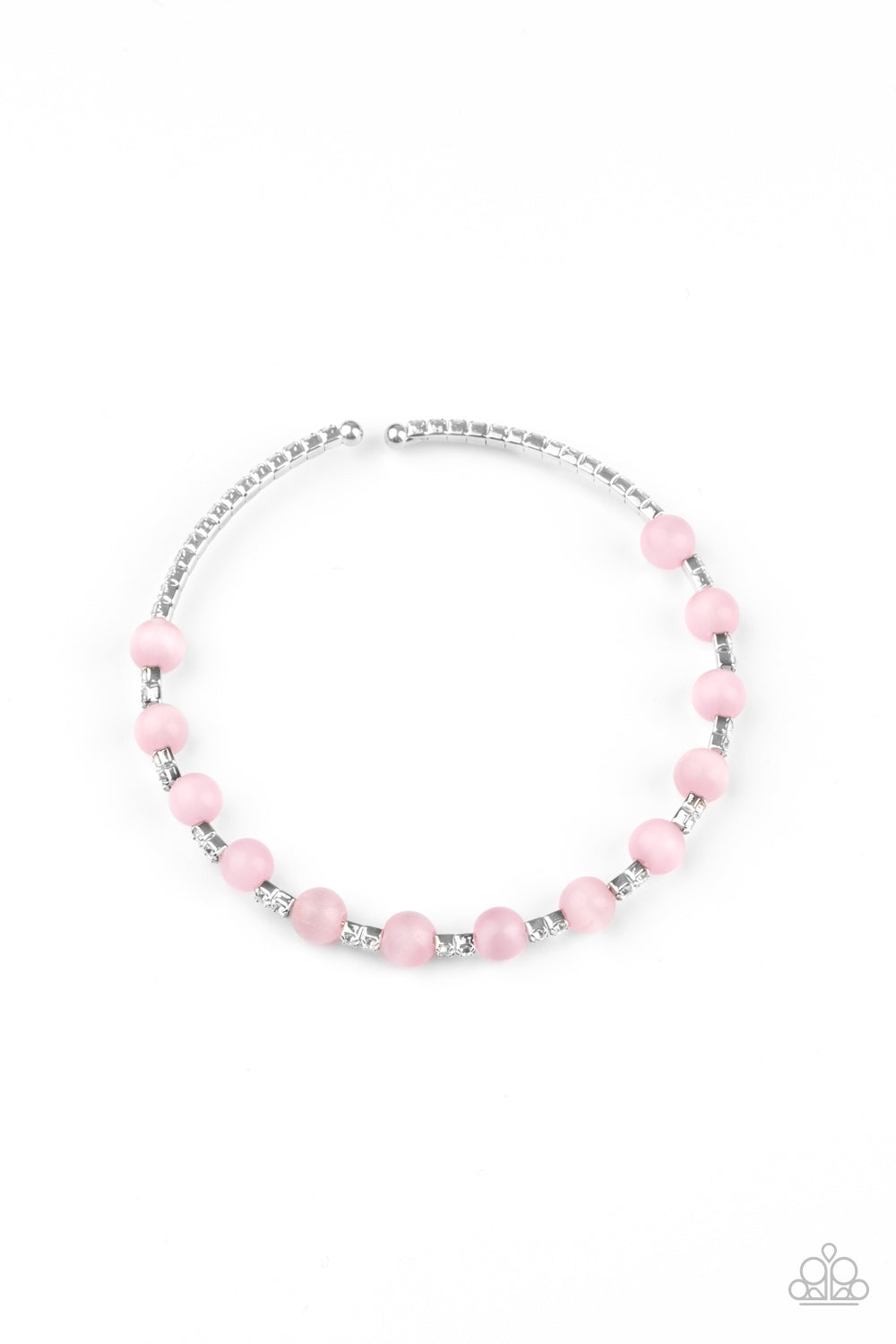 Tea Party Twinkle Pink Bracelet - Paparazzi Accessories  Glassy pink cat's eye stones are fitted in place along a dainty strand of glassy white rhinestones, creating a twinkly cuff around the wrist.  All Paparazzi Accessories are lead free and nickel free!  Sold as one individual bracelet.