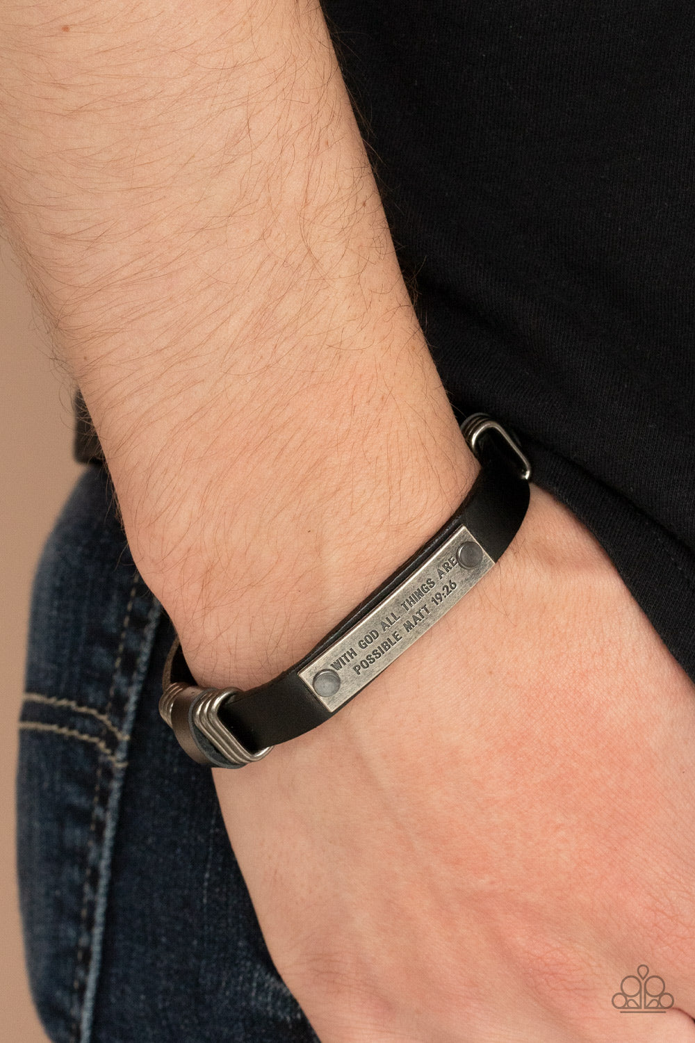 Make It Possible Black Urban Bracelet - Paparazzi Accessories  A silver frame is stamped in the bible passage, "With God all things are possible, Matt 19:26," is studded in place across the front of a black leather band, gunmetal rings are added to the display for a rustic finish. Features an adjustable snap closure.  All Paparazzi Accessories are lead free and nickel free!  Sold as one individual bracelet.
