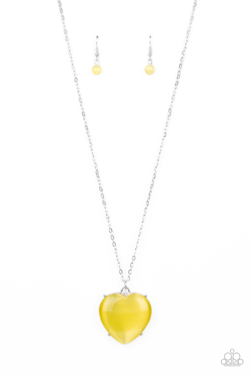 Warmhearted Glow Yellow Necklace - Paparazzi Accessories  An oversized Illuminating cat's eye stone frame swings from the bottom of a lengthened silver chain, creating a flirtatious pendant. Features an adjustable clasp closure.  All Paparazzi Accessories are lead free and nickel free!  Sold as one individual necklace. Includes one pair of matching earrings.